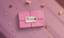 Pink gift top view. mothers day text on banner - stock photo