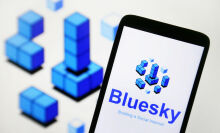 BlueSky social logo on phone screen