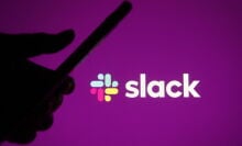 Slack logo with a silhouetted hand holding a phone 