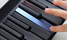 Fingers on a piano