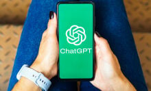 ChatGPT on a smartphone in a woman's lap