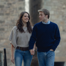 On "The Crown" two actors who look like Kate and William walk hand in hand. 