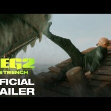 Image of Jason Statham holding off a megalodon with his foot from "The Meg 2: The Trench."