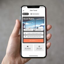 The Uber app seen on a smartphone open at the flight booking section.
