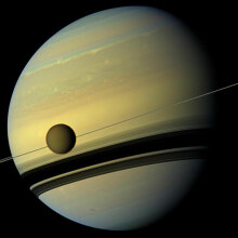 a moon orbiting Saturn 