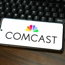 Comcast logo on phone screen
