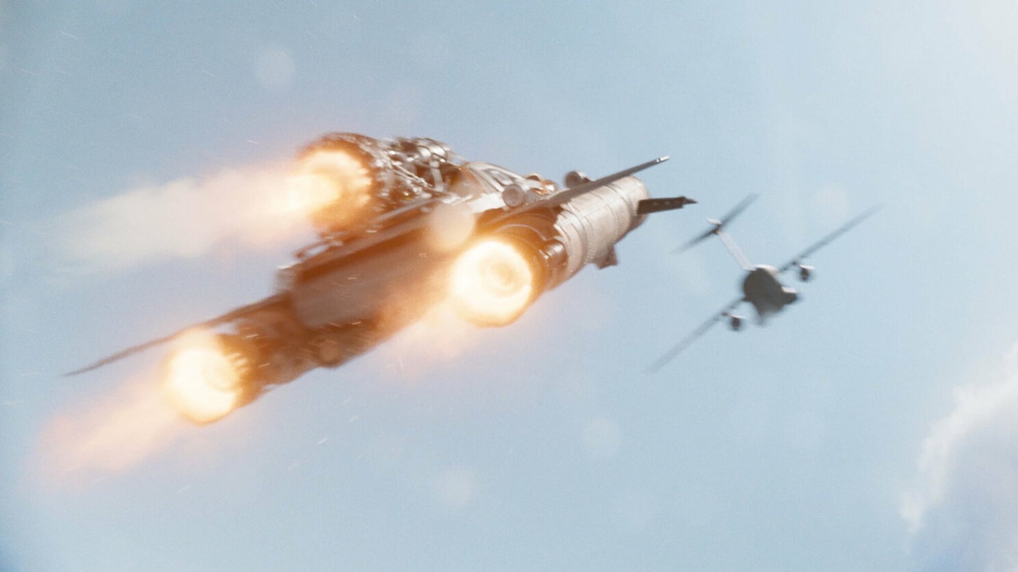 A rocket strapped to a car zooms into the sky in "F9."