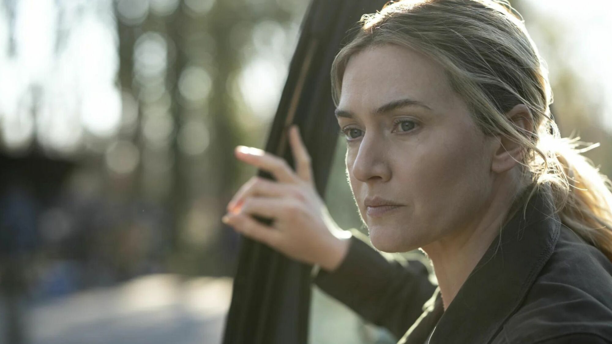 Kate Winslet looks serious in "Mare of Easttown."