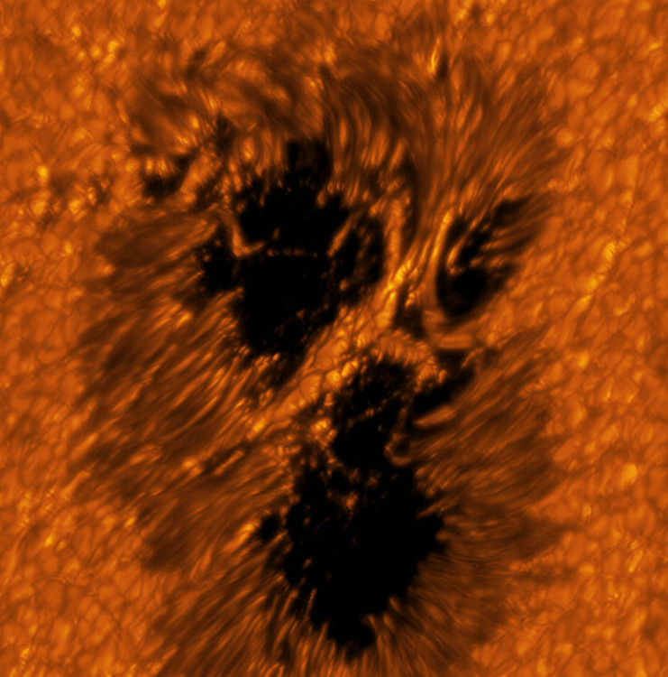 Telescope observing light bridges over sunspots