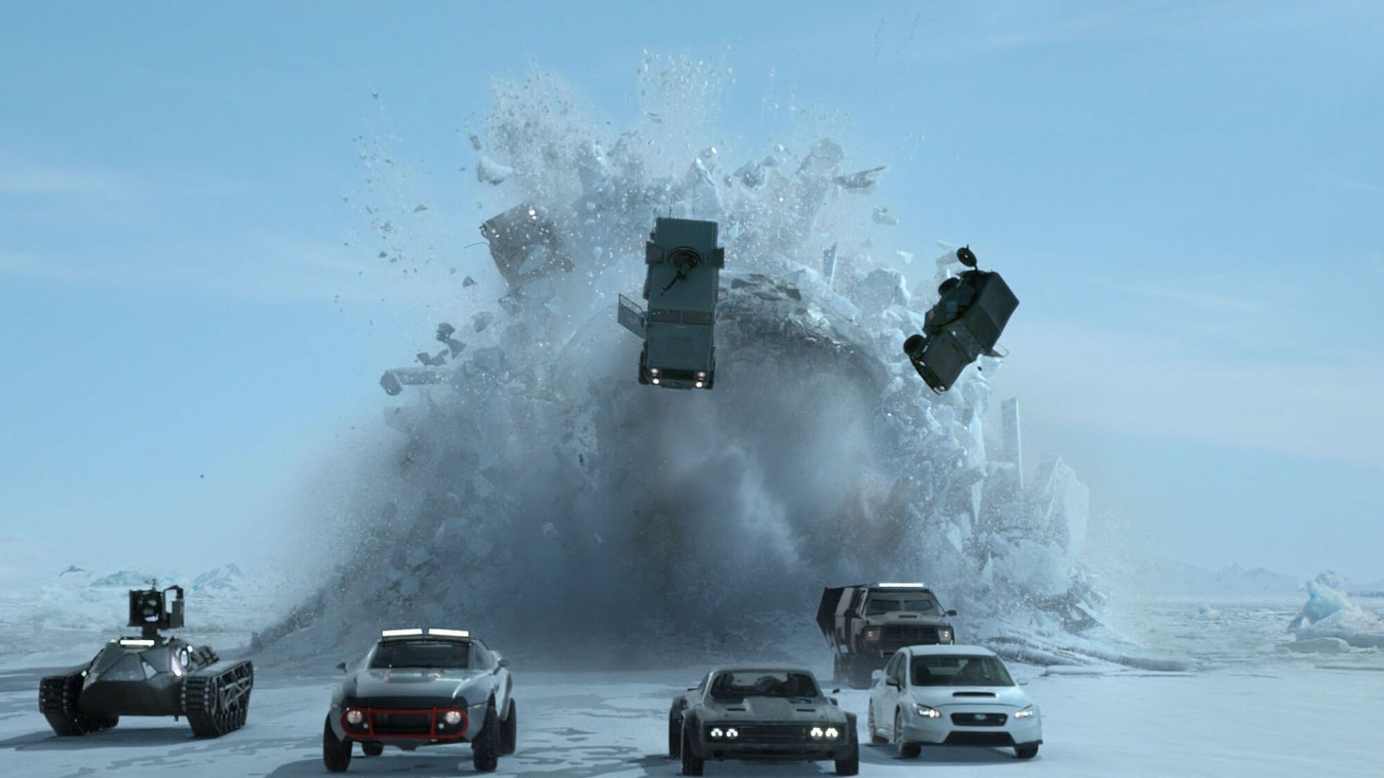 A submarine breaks through the ice, sending cars flying in "The Fate of the Furious"