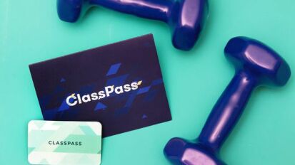 Weights and a ClassPass card on a blue background.