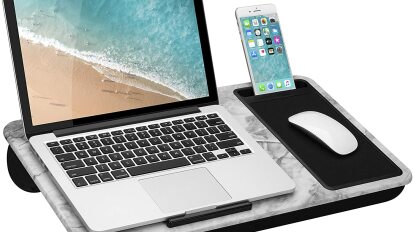 lap desk with laptop, mouse, and phone against a white background