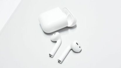 Apple AirPods on a white background.