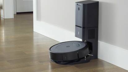 the Roomba i3+ docked at its charging station