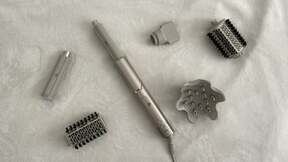 silver Shark hair styling tool with styling attachments around it