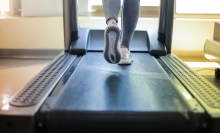person walking on treadmill