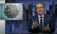John Oliver sits presenting beside a computer graphic that reads "Carbon Offsets."