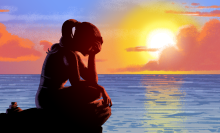 An image of a woman holding her head by the sea and setting sun.