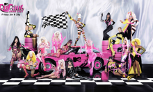 The cast of "Rupaul's Drag Race" Season 15 pose against a pink car.