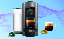 Coffeemaker with water tower to the right, green coffee pod to the left, gold coffee pod to the right