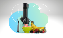 soft serve maker next to fruit with gray and blue background