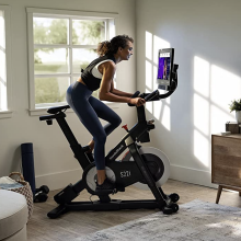 person riding a stationary bike