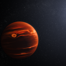 An exoplanet orbiting twin stars