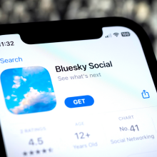 A screenshot of the Bluesky app store page bulled up on a mobile phone.