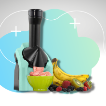 soft serve maker next to fruit with gray and blue background