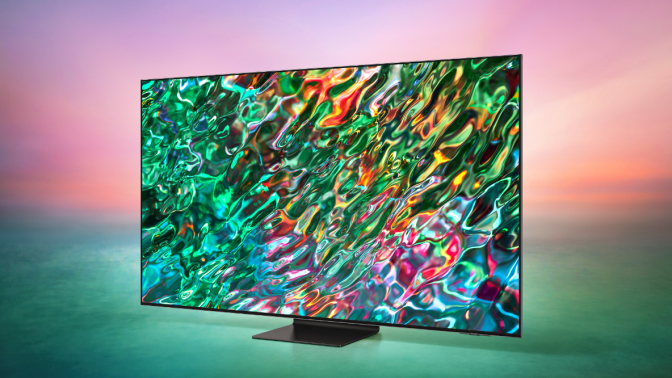 Samsung QLED TV with abstract water screensaver on green and pink gradient background