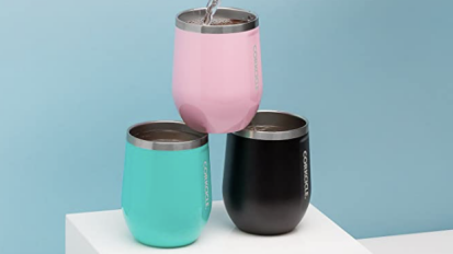 three travel cups stacked atop each other