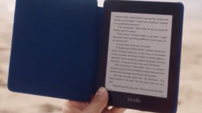Person holding a Kindle Paperwhite.