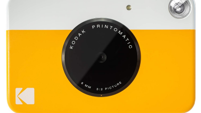 Instant print camera on a white background.