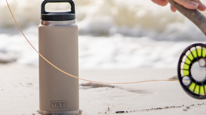 A reusable water bottle from YETI outside.