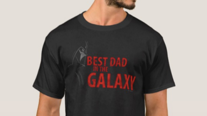 Person wearing a "Best dad in the galaxy" shirt.