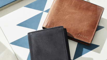 Two wallets from Fossil on a colorful background.