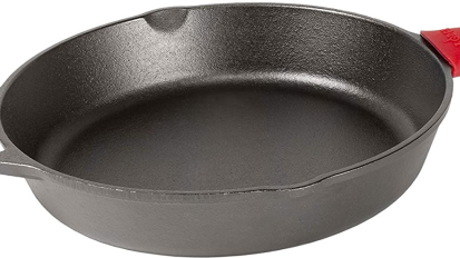 A Lodge cast iron skillet on a white background.