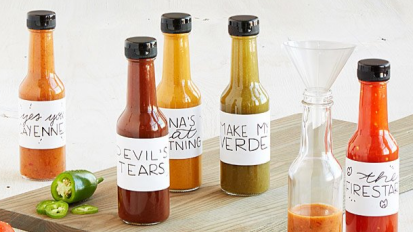 A DIY hot sauces from Uncommon Goods on a kitchen counter.