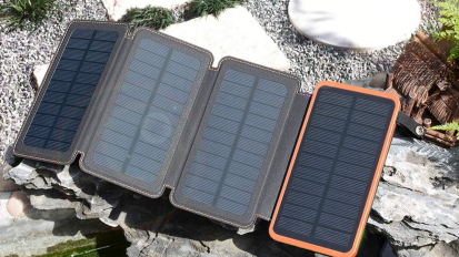 Hiluckey solar-powered portable charger outside.