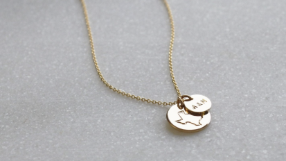 gold personalized necklace with Texas and "A&M" charms