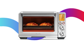 Silver toaster oven air fryer on a colorful background