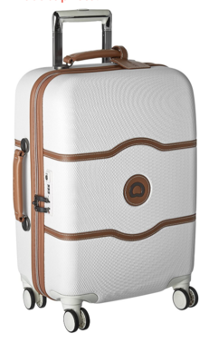 White suitcase with brown accents